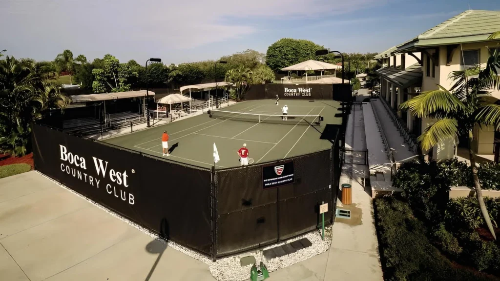 Tennis courts and clubhouse at Boca West Country Club in Boca Raton Florida