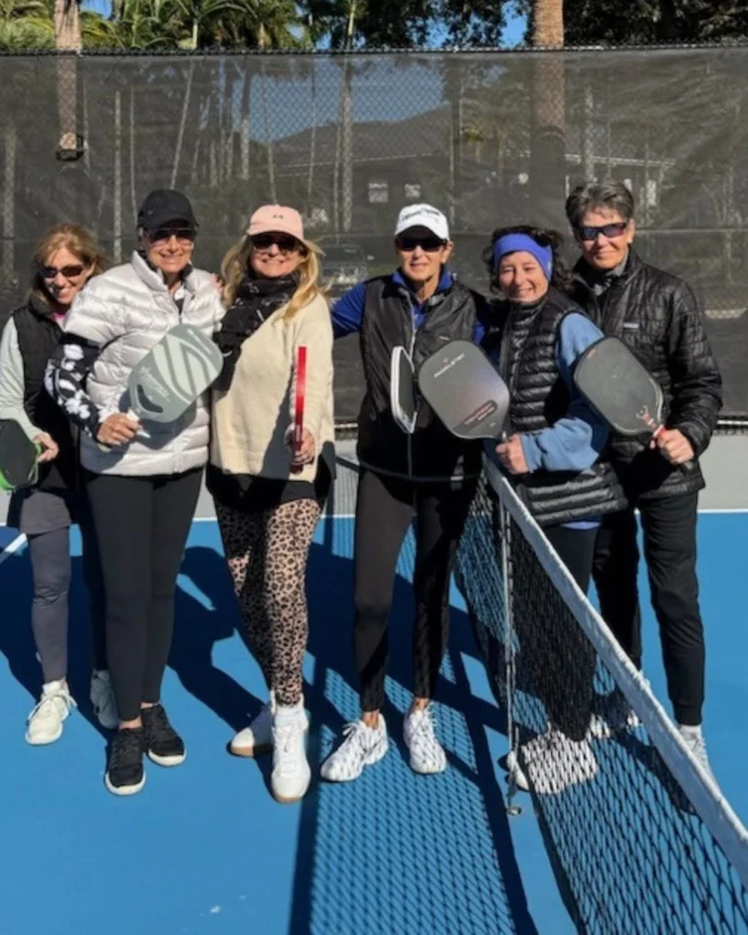 Residents playing pickleball at Boca West Country Club in Boca Raton