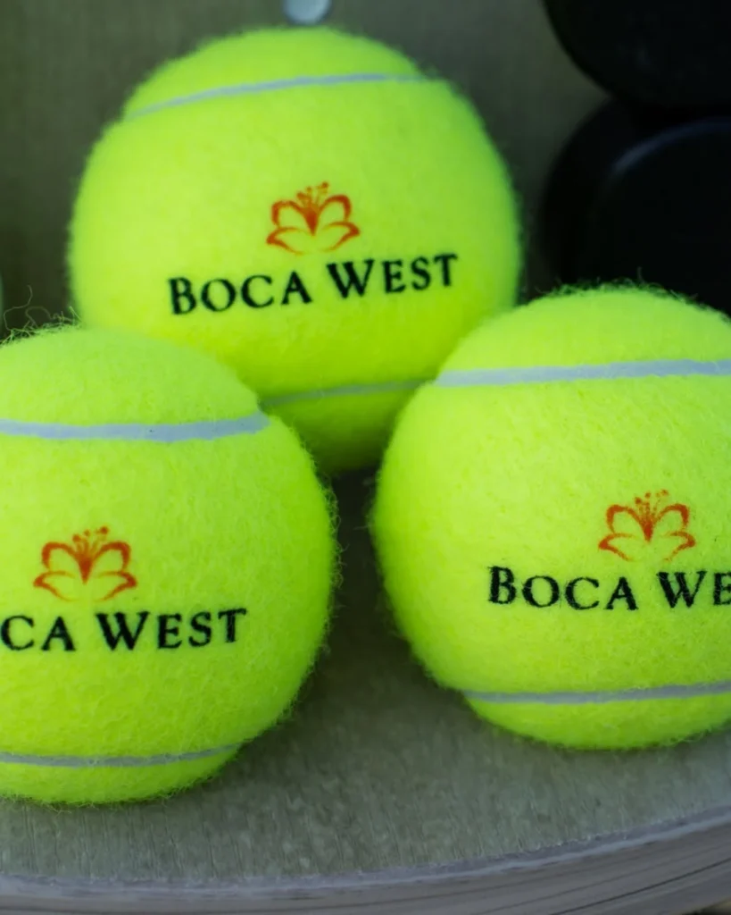 Branded tennis balls at Boca West Country Club tennis facilities