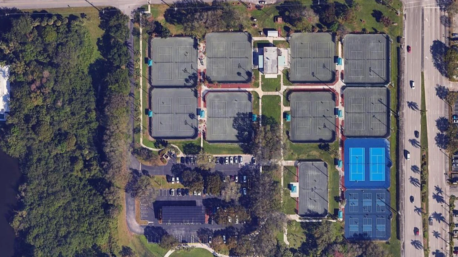 Aerial view of Boynton Beach Tennis & Pickleball Center showing Har-Tru tennis courts, hard courts, and pickleball courts