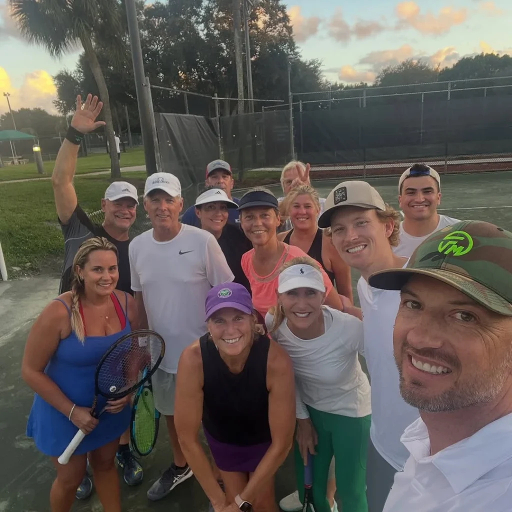 Players participating in social tennis at Boynton Beach Tennis & Pickleball Center