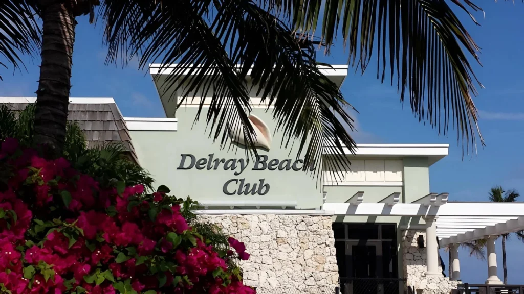 Entrance and clubhouse exterior at Delray Beach Club in Delray Beach Florida