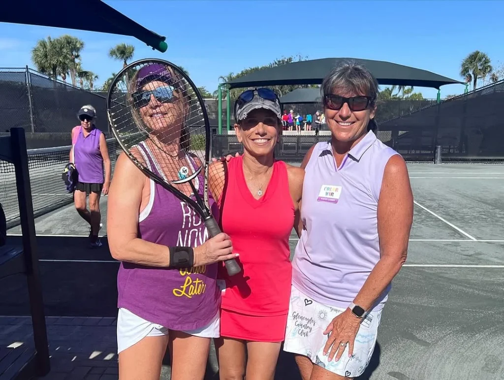 Women participating in a tennis social event at Gleneagles Country Club in Delray Beach