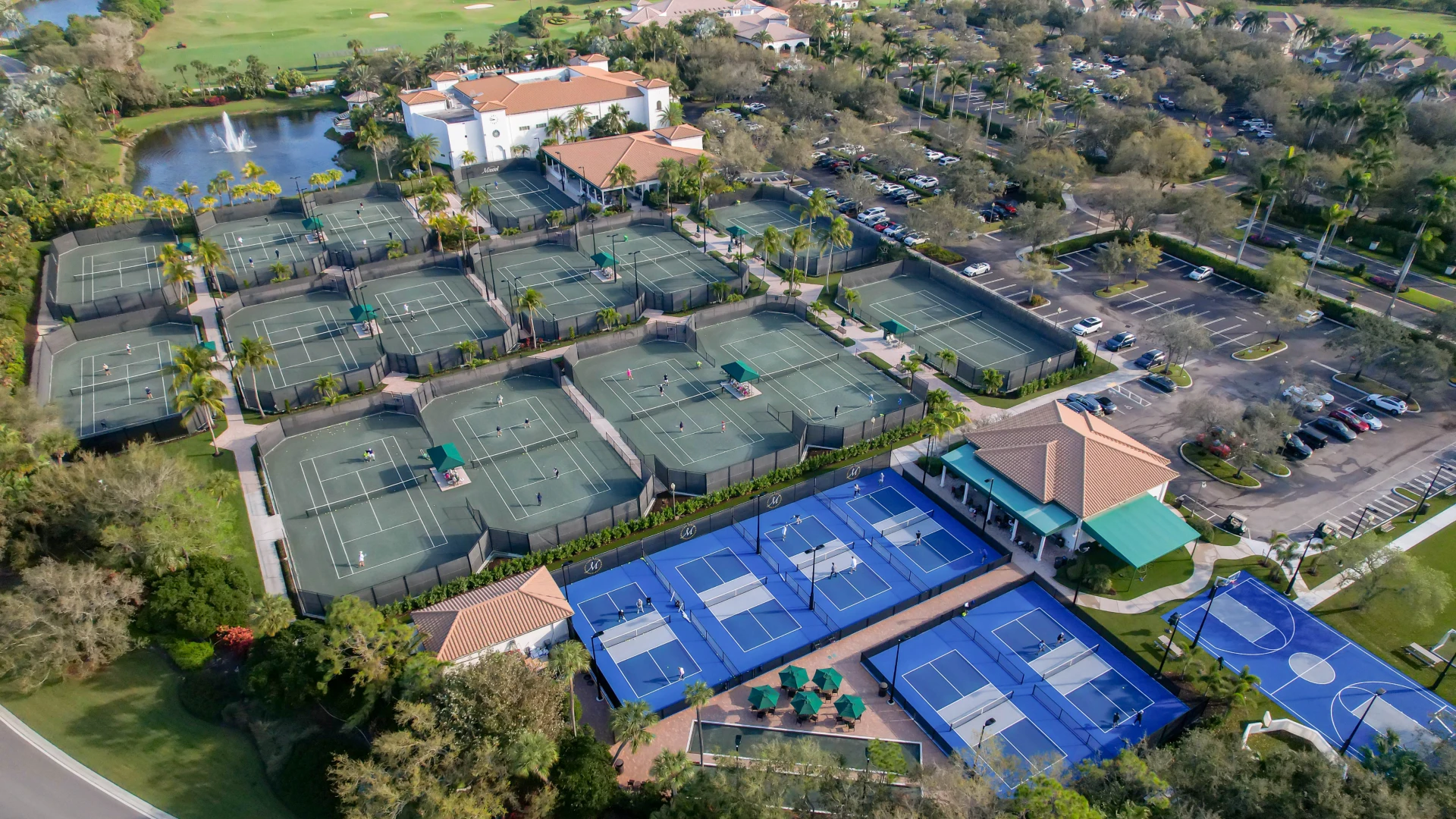 Aerial view of the tennis courts, pickleball courts, and sports complex at Mirasol in Palm Beach Gardens Florida