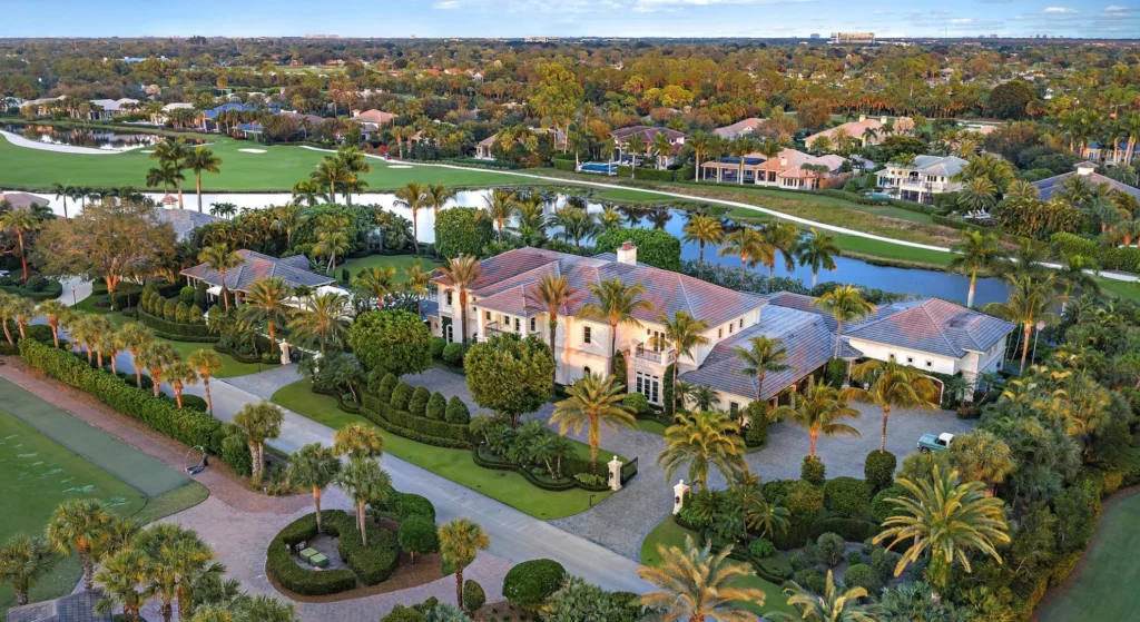 Luxury home overlooking a golf course and lake in Palm Beach Gardens Florida