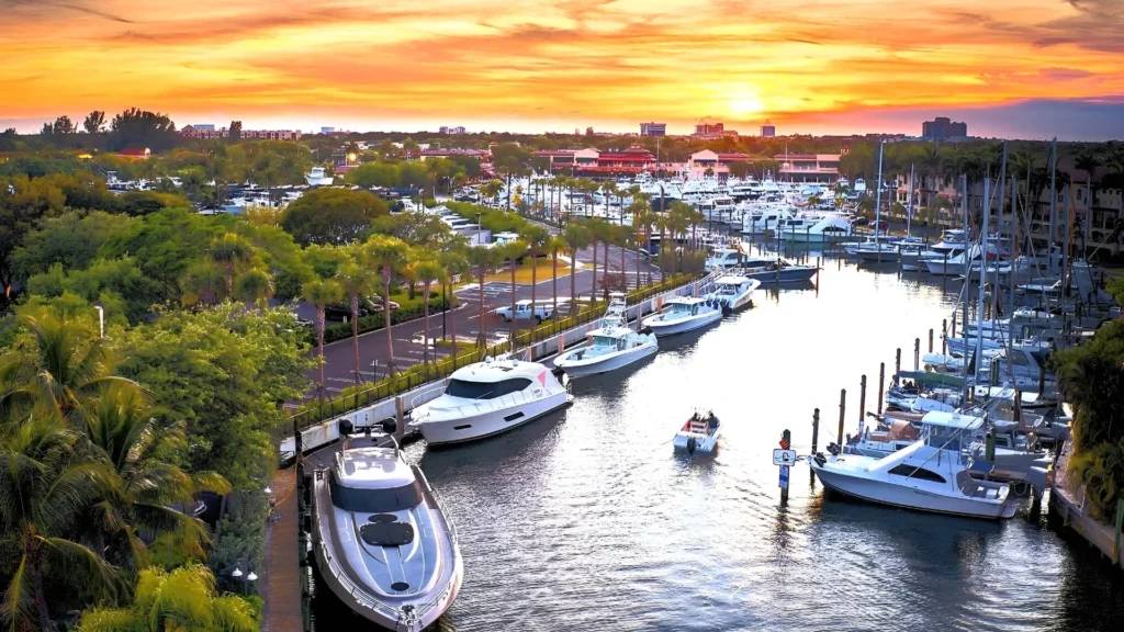 Boats docked at a marina near Palm Beach Gardens Florida at sunset