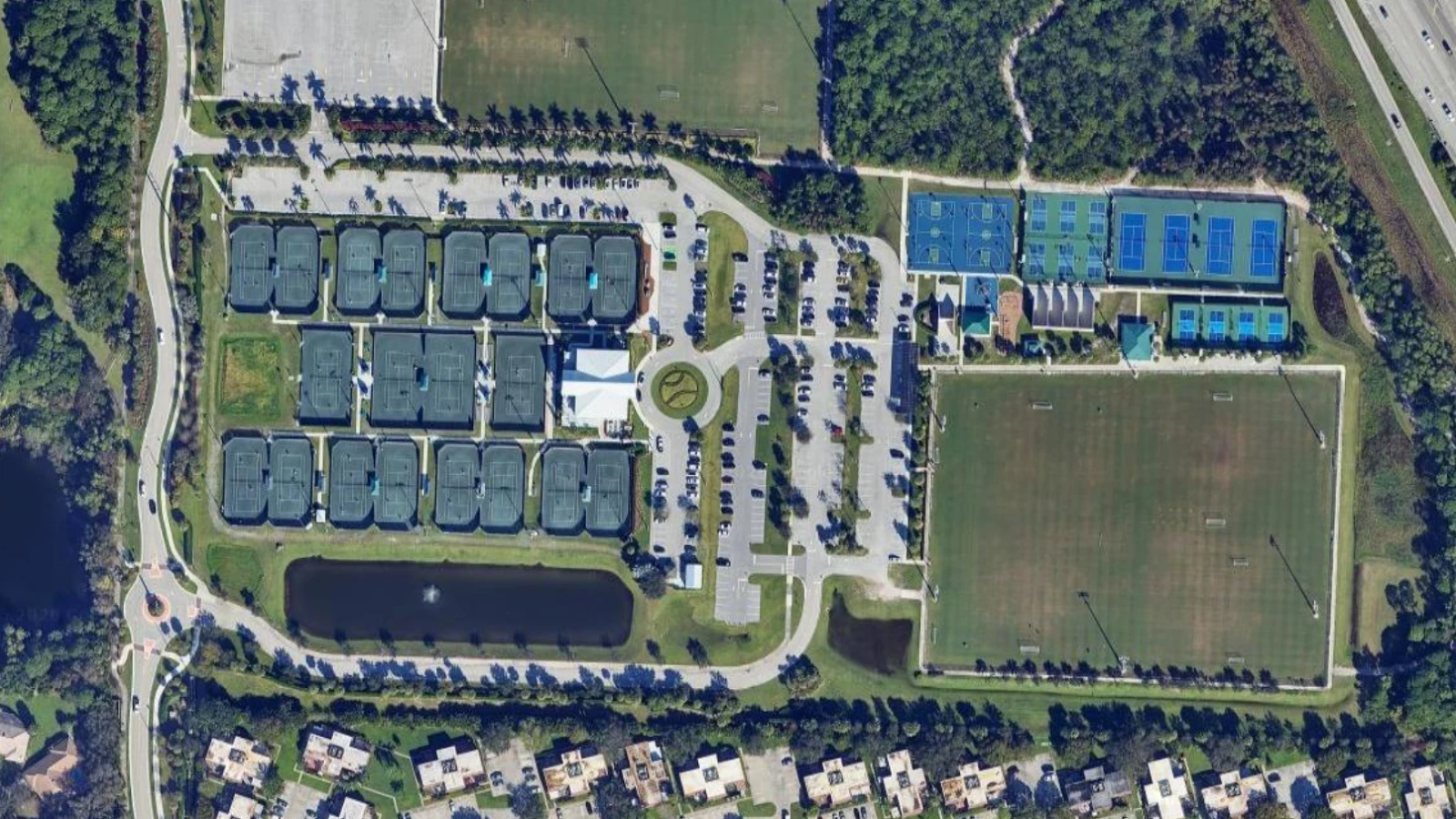 Aerial view of Palm Beach Gardens Tennis and Pickleball Center showing Har-Tru courts and pickleball complex