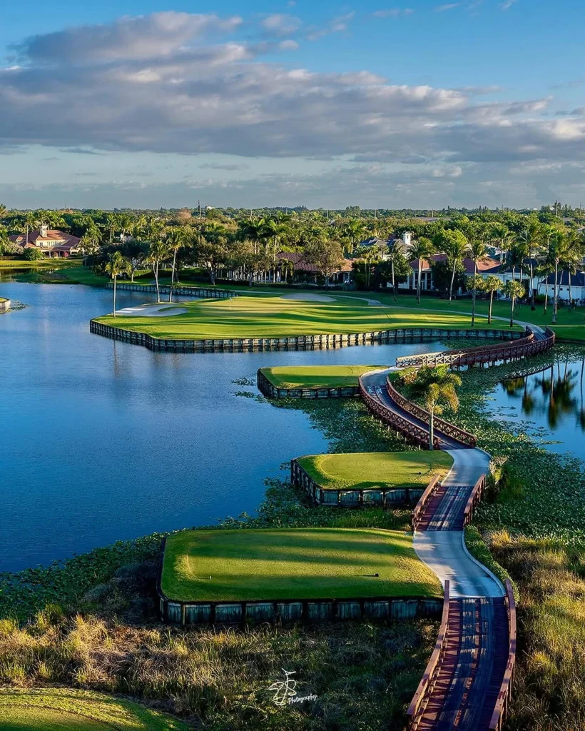 Signature island-style golf hole at Polo Club Boca Raton in Boca Raton Florida