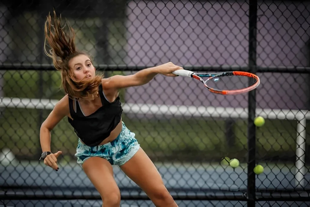 Competitive junior tennis player training at South County Regional Park Tennis Center