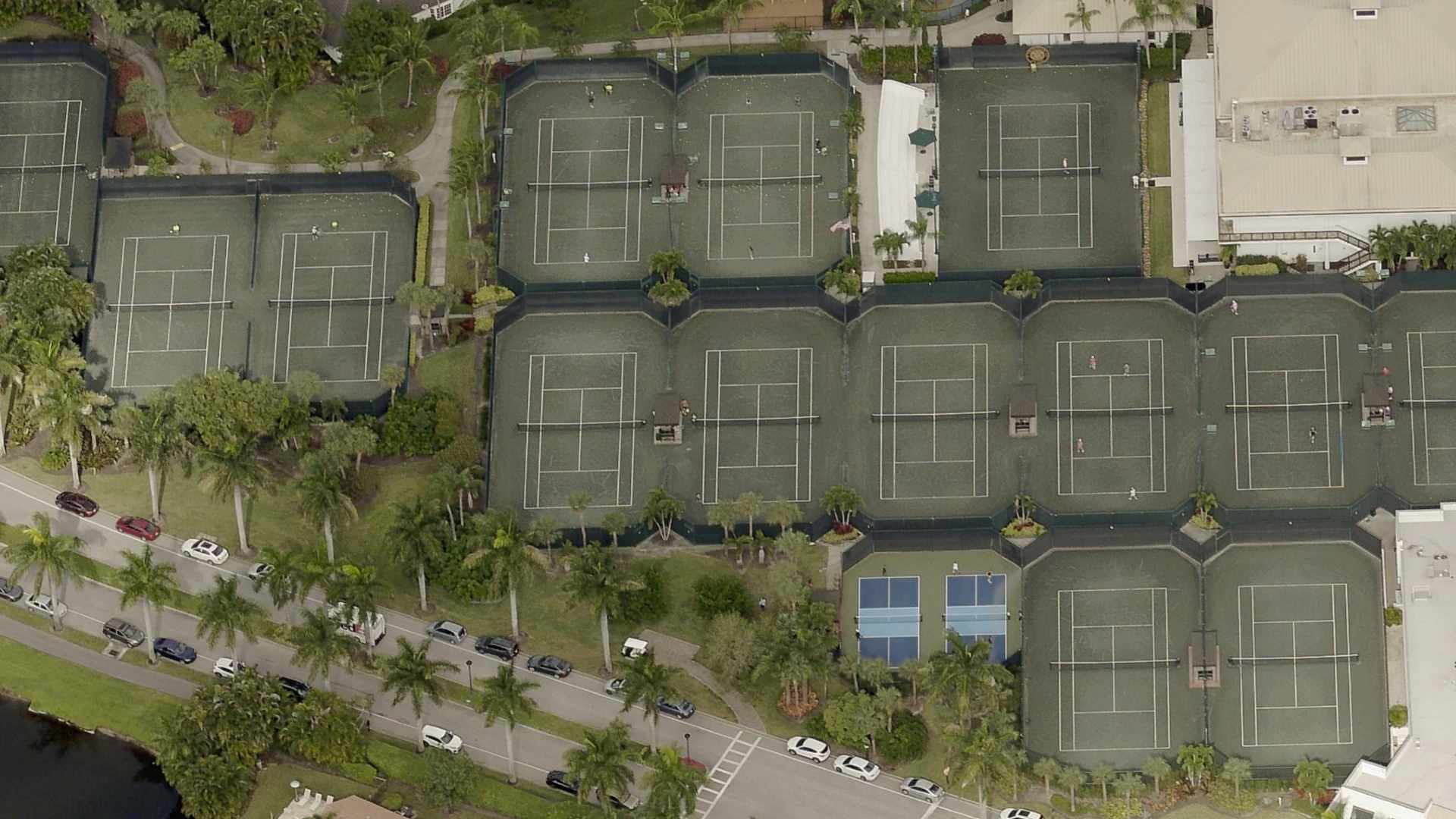 Aerial view of the tennis complex and clay courts at St. Andrews Country Club in Boca Raton Florida