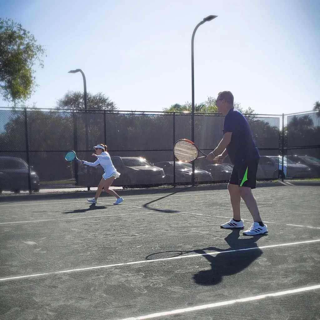 Members playing tennis at The Wanderers Club in Wellington Florida
