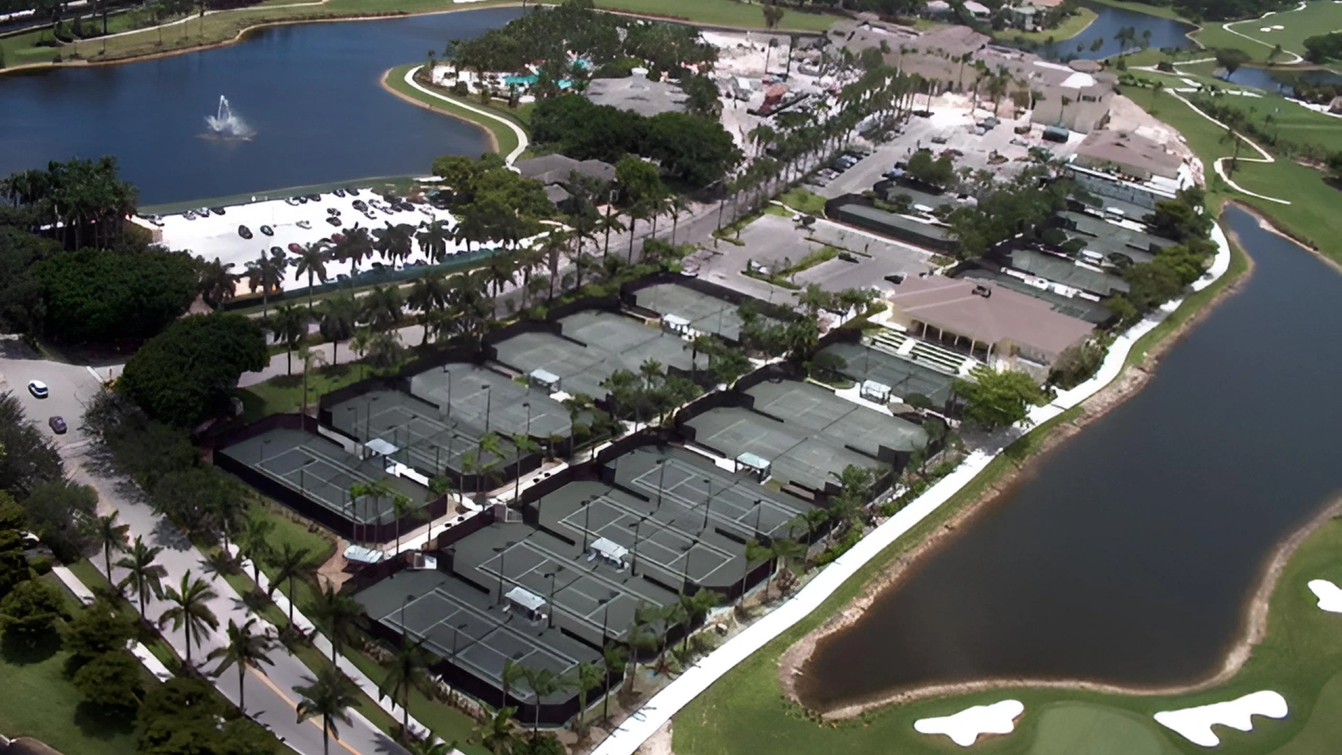 Aerial view of the tennis center and club amenities at Woodfield Country Club in Boca Raton