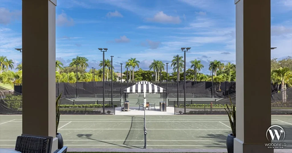 View from the clubhouse overlooking tennis courts at Woodfield Country Club