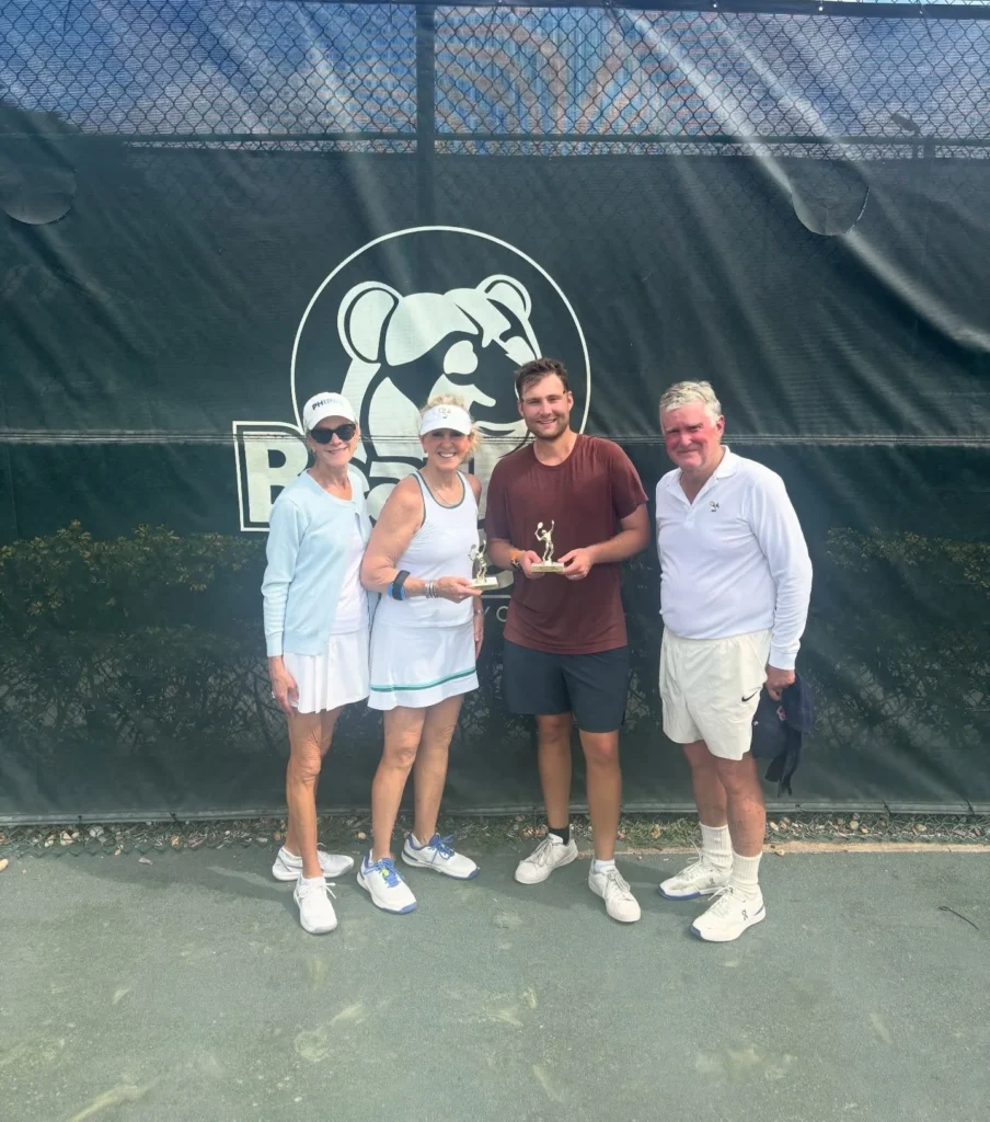 Bear Lakes Country Club members posing with trophies after a club tennis tournament