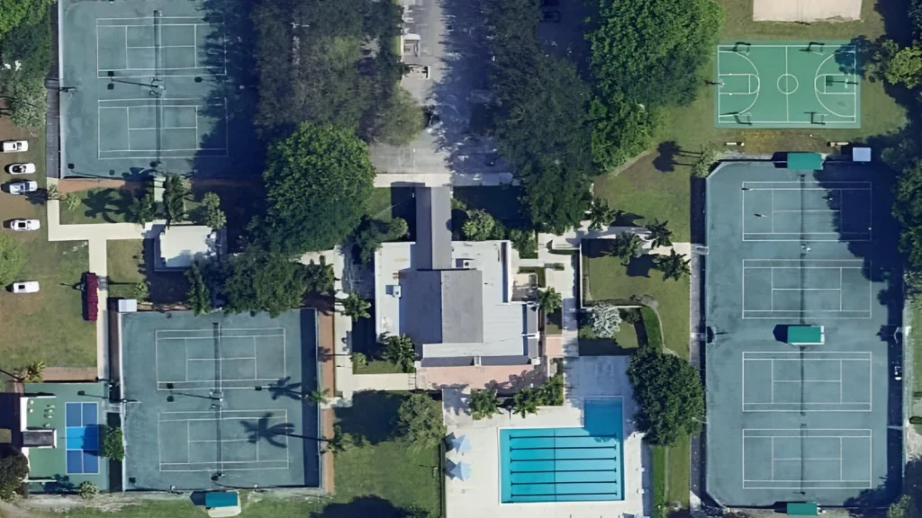 Aerial view of the Boca Bath & Tennis Club racquet complex, pool and clubhouse in Boca Raton