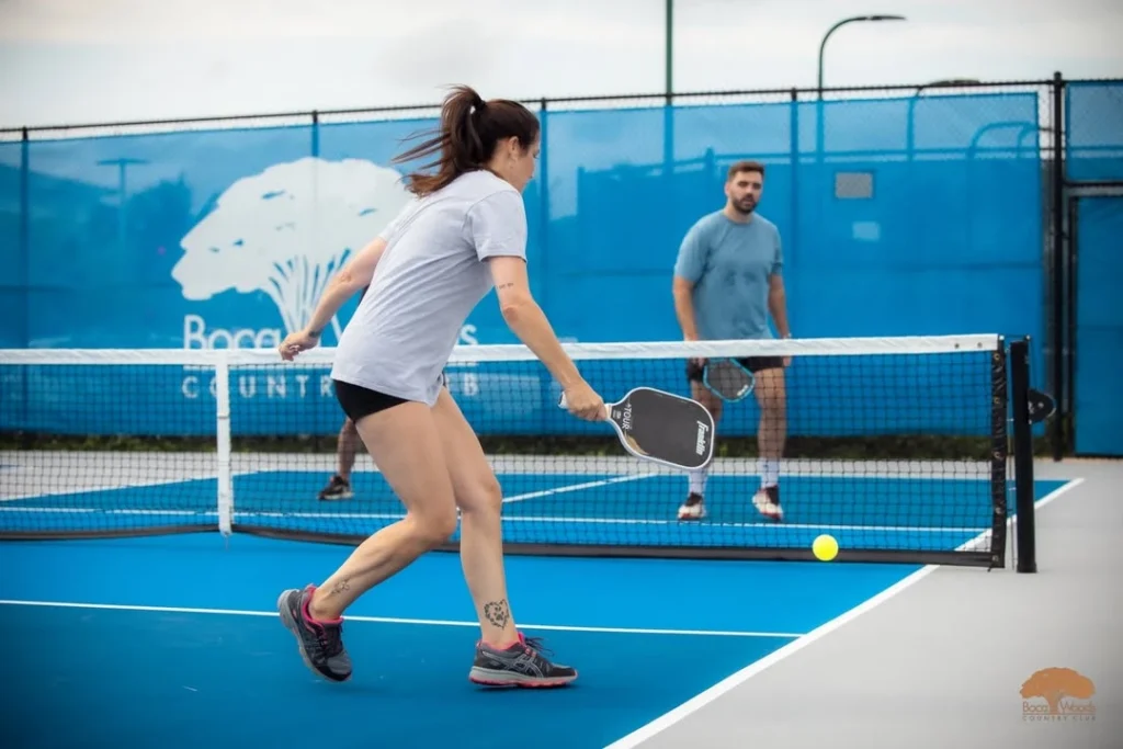 Members playing pickleball at Boca Woods Country Club.