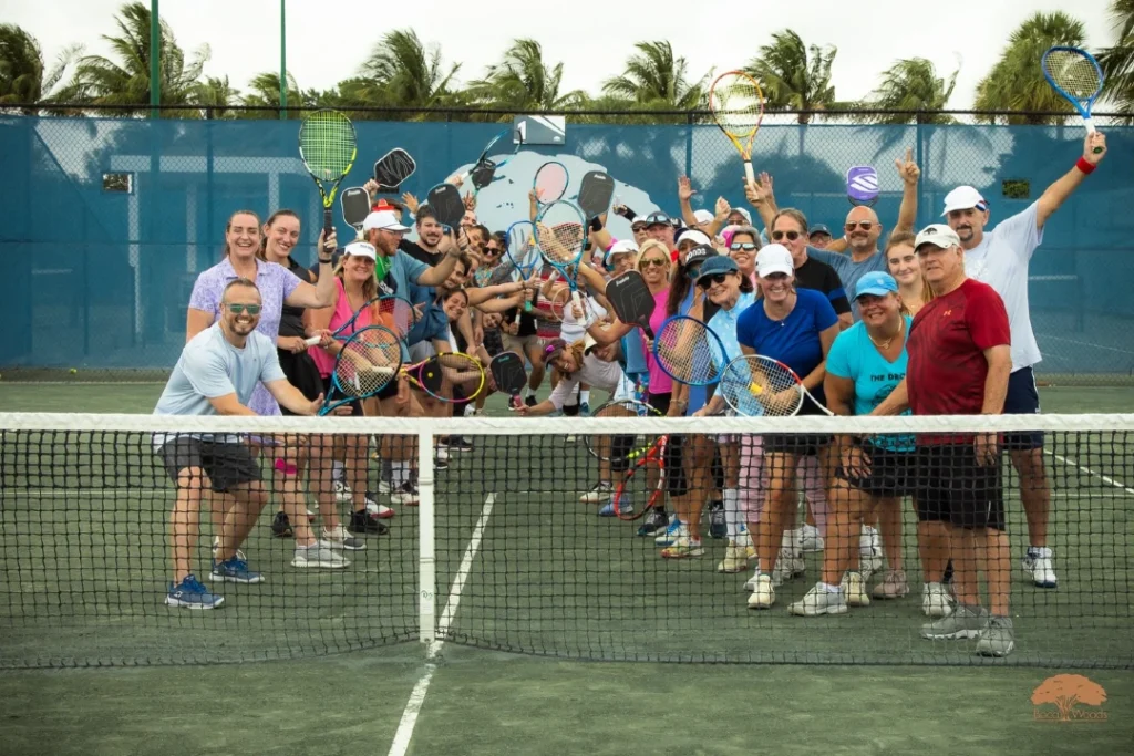 Members gather for a tennis and pickleball social event at Boca Woods Country Club.