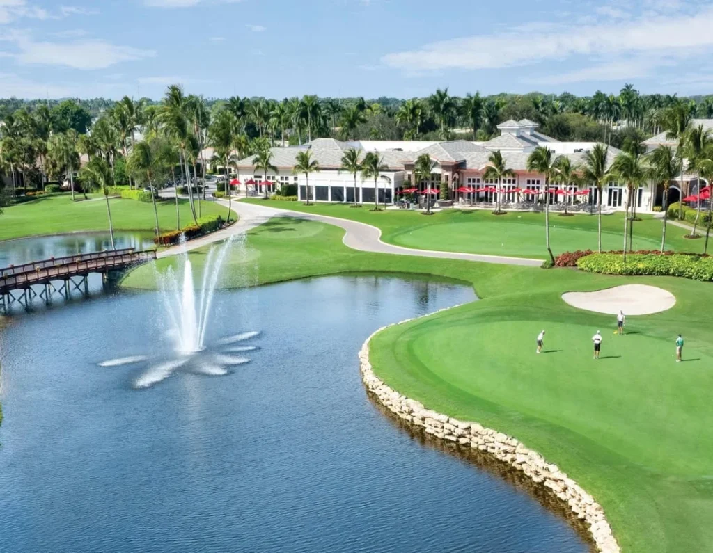 Aerial view of Delaire Country Club golf course, clubhouse, and water fountain feature
