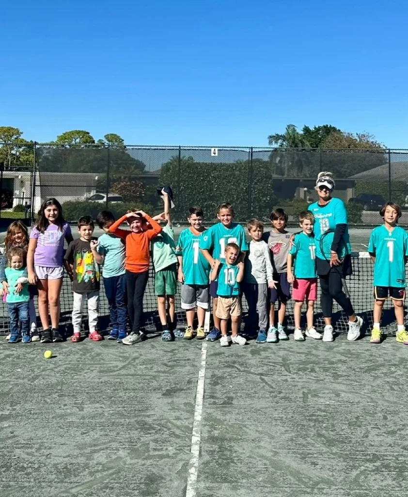 Children participating in a junior tennis program at Eastpointe Country Club