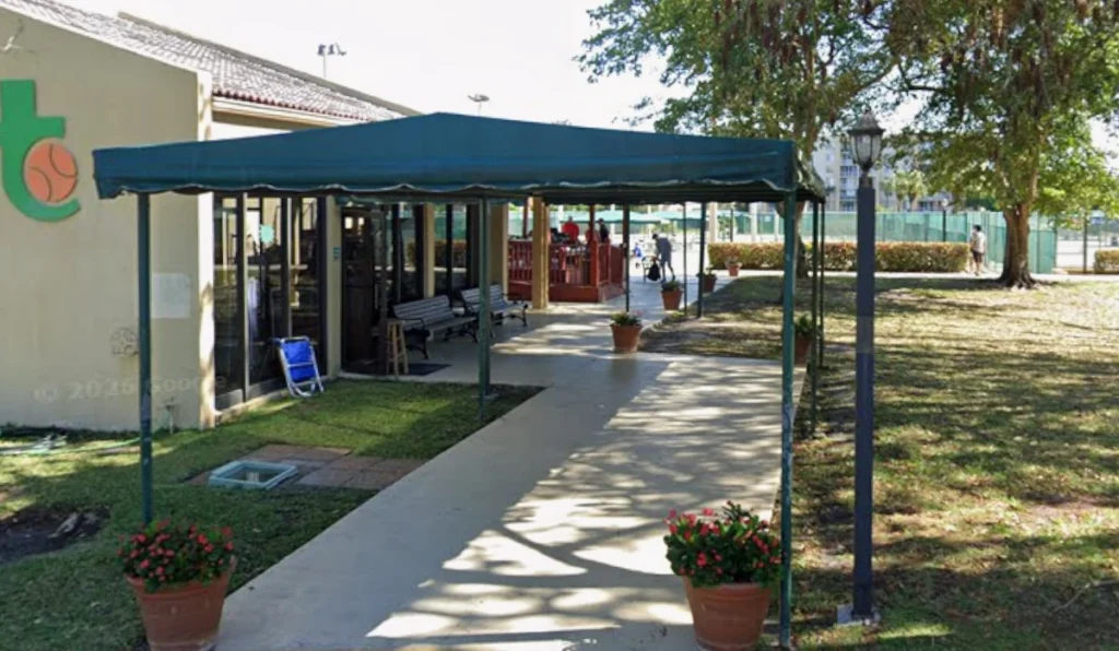 Clubhouse and tennis facilities at Tennis Club of Palm Beach in West Palm Beach