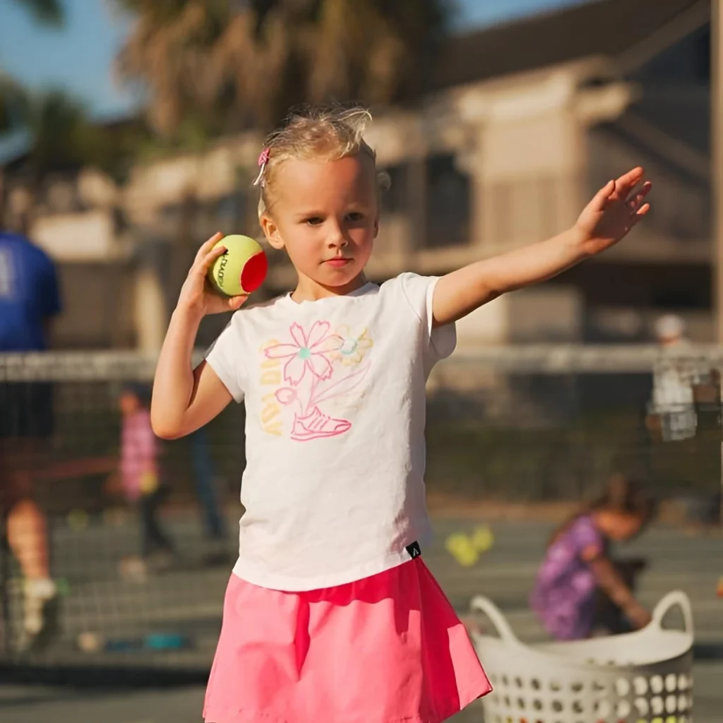 Young junior tennis player training at One Tennis Academy in Boca Raton
