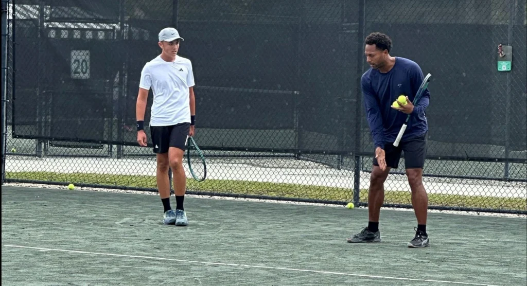 scoville jenkins working with advanced junior player at scoville jenkins tennis academy in wellingon