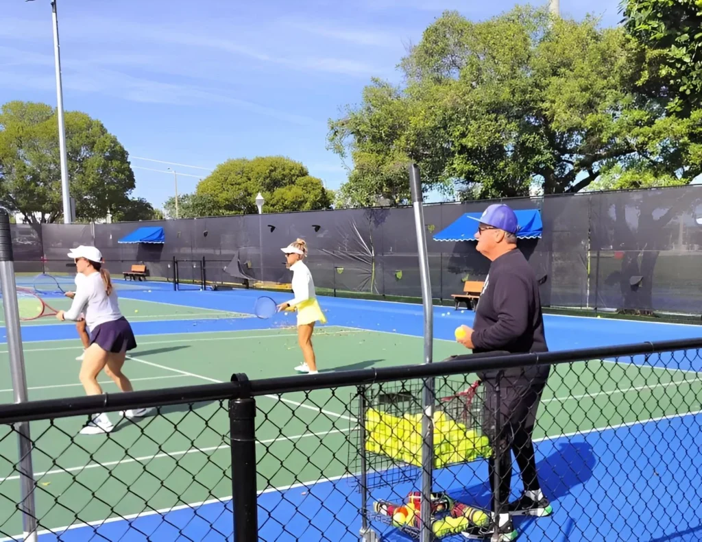Tennis clinic instruction at South Olive Tennis Center