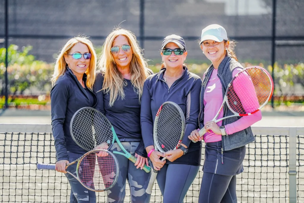 Women's tennis players gathering at The Oaks Boca Raton racquet center