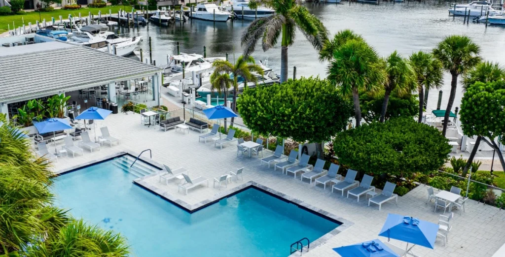 Resort-style pool overlooking the marina at Yacht & Racquet Club