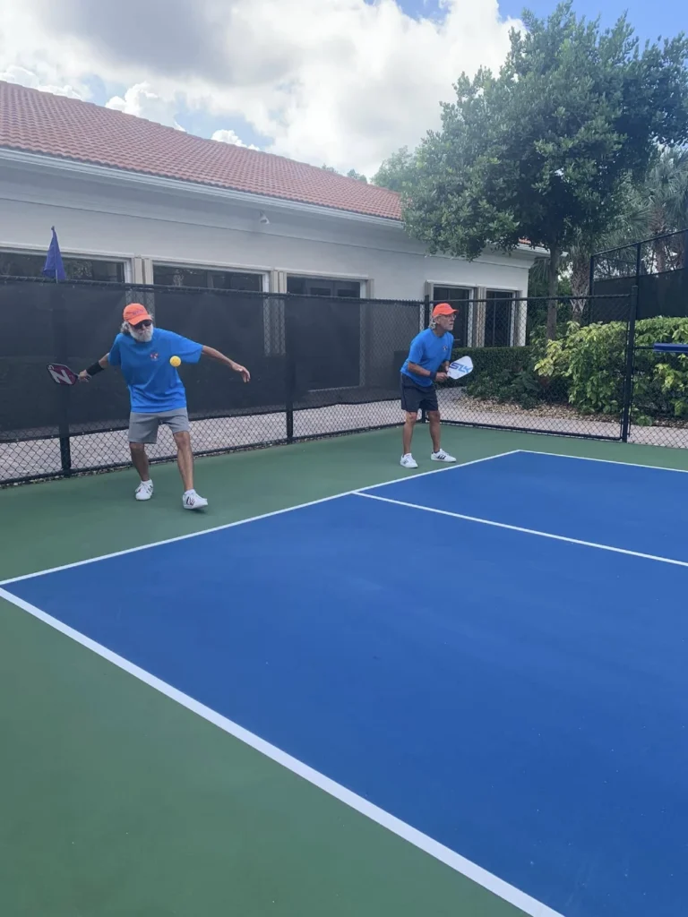 Residents playing pickleball at Four Seasons at Delray Beach