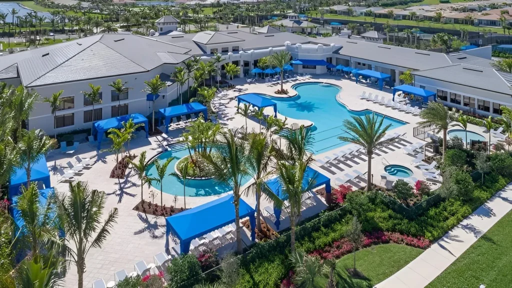 Resort-style swimming pool and clubhouse amenities at Valencia Bay in Boynton Beach.