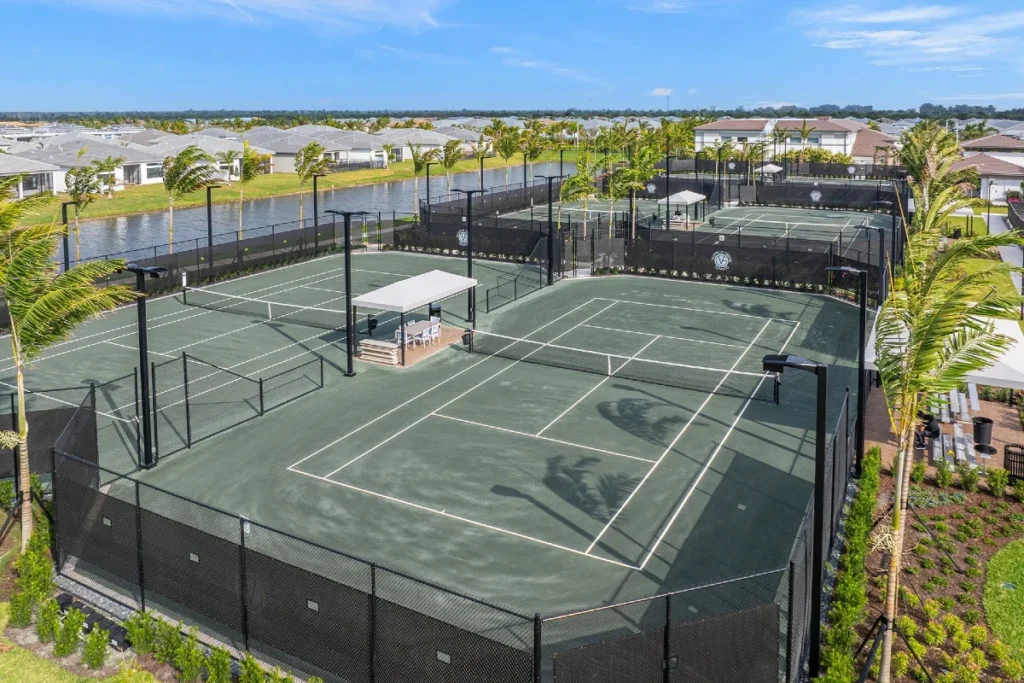 Lighted Har-Tru clay tennis courts at Valencia Grand in Boynton Beach.