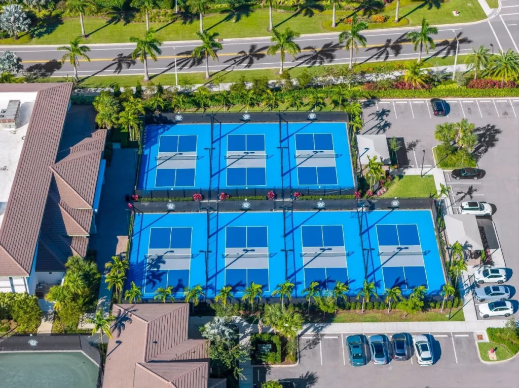 Aerial view of Valencia Grand's outdoor pickleball complex in Boynton Beach.