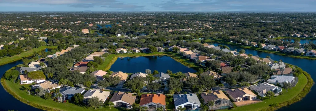 Aerial view of Valencia Isles homes surrounding lakes in Boynton Beach.