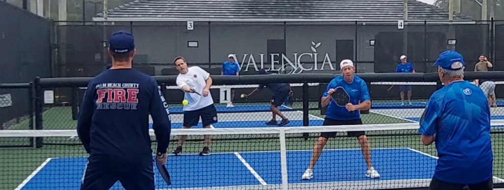 Residents playing pickleball at Valencia Reserve in Boynton Beach